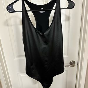 Black Leatherlike TNA Bodysuit from Aritzia